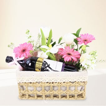 Blush Cheers (Pink Gerberas + White Tulips with  CornerStone Cabernet Sauvignon)