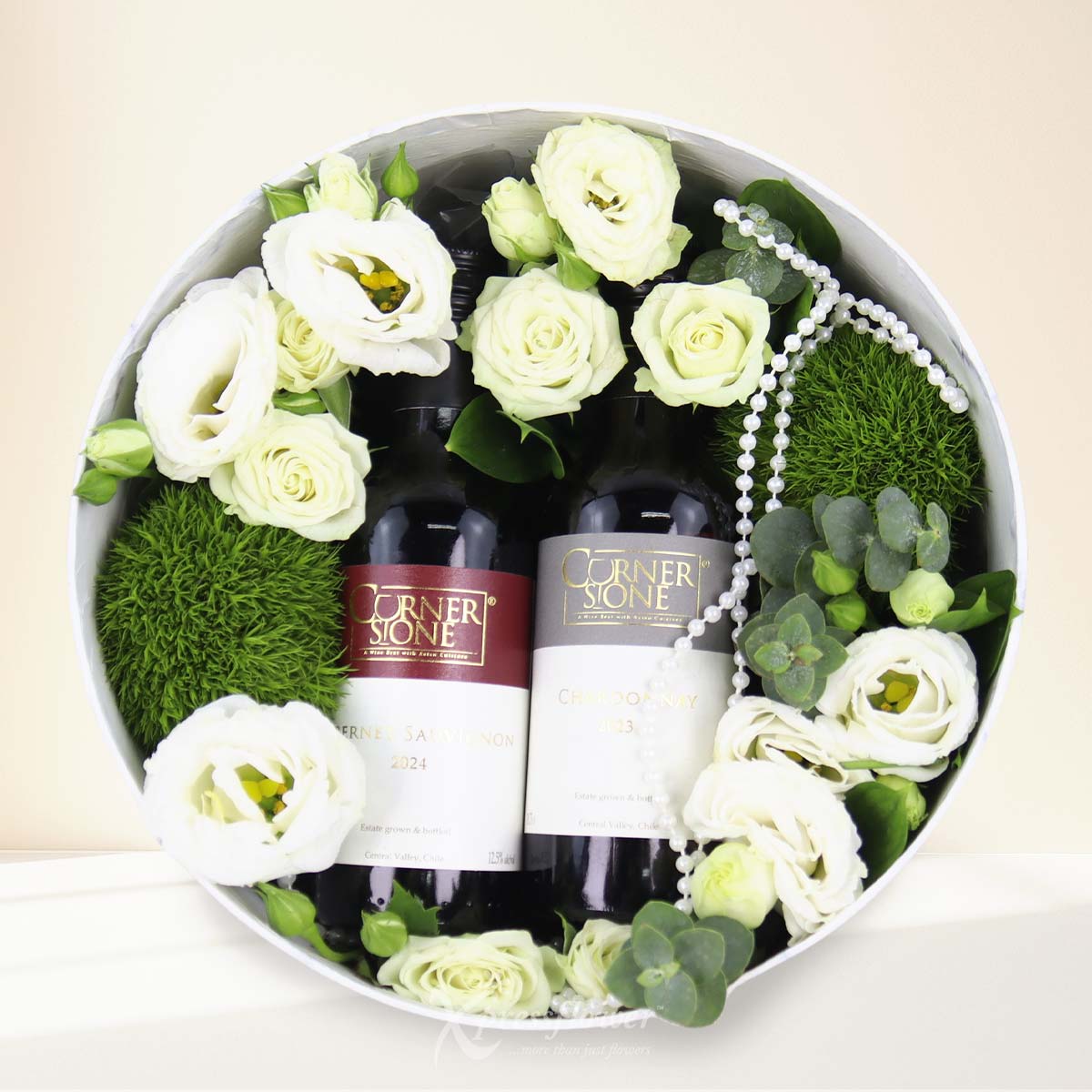 Wine Whispers  (Eustoma + Rose Spray with  CornerStone Mini Cabernet Sauvignon)