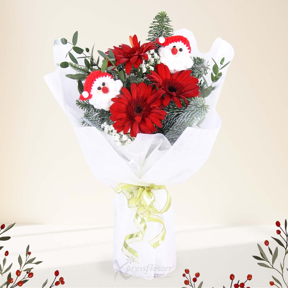  Santa's Cheer (3 Red Gerberas with Mini Santas)