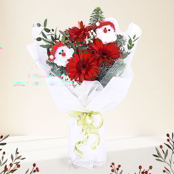 Santa's Cheer (3 Red Gerberas with Mini Santas)
