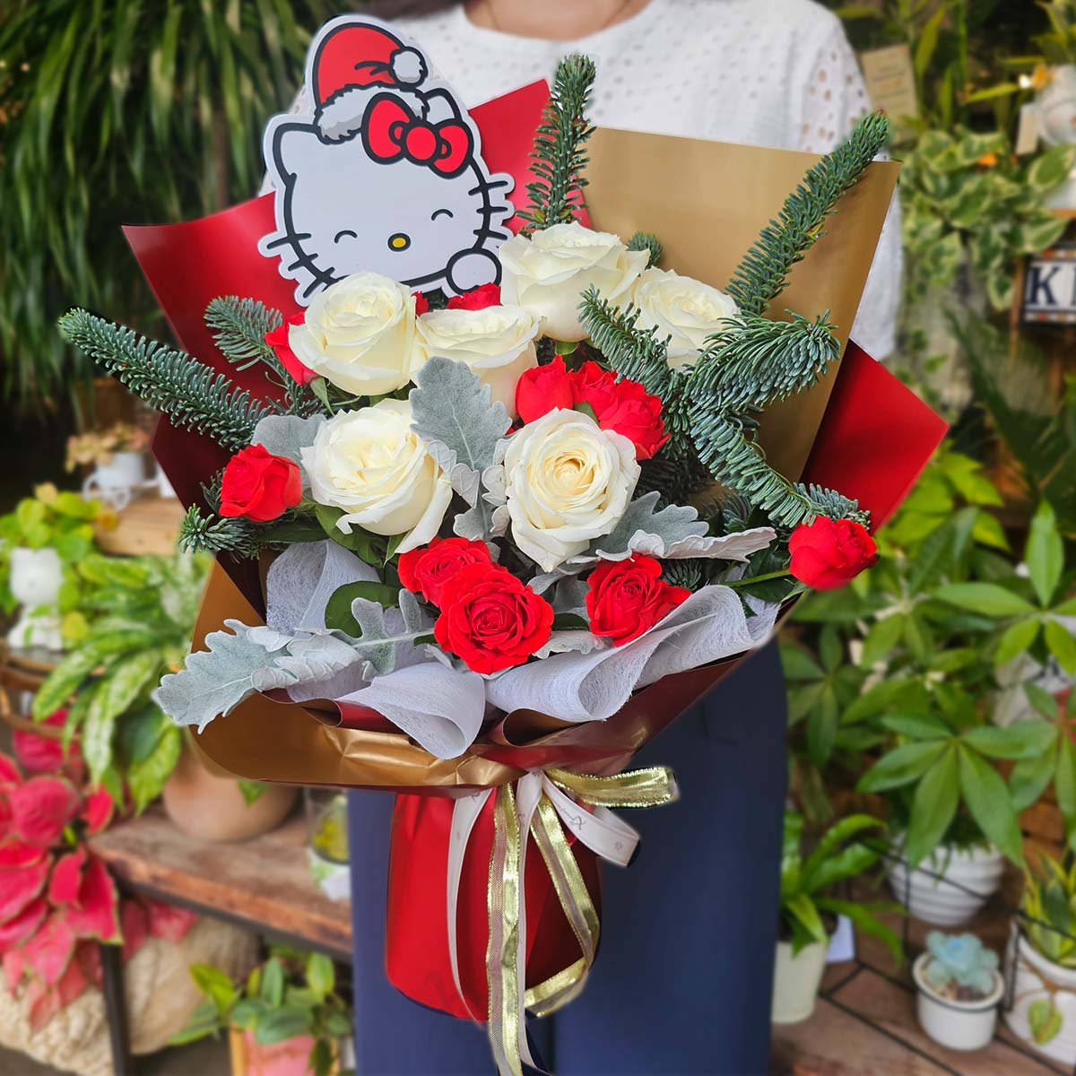 XMBQ2504 Holiday Kitty Christmas Hello Kitty with 6 White Roses Red Rose Sprays 3a