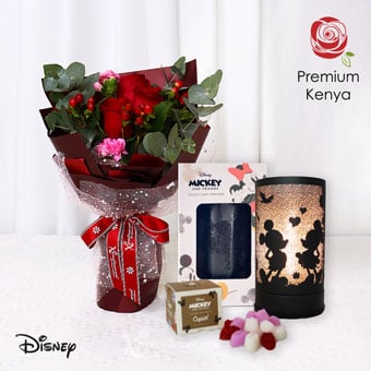 Illuminating Joy (3 Red Roses with Disney Touch Warmer & Candle Bundle)