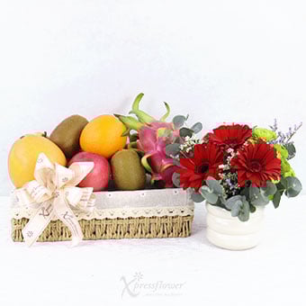 Crimson Bounty (Red Gerberas Vase Arrangement with Fruits Basket)