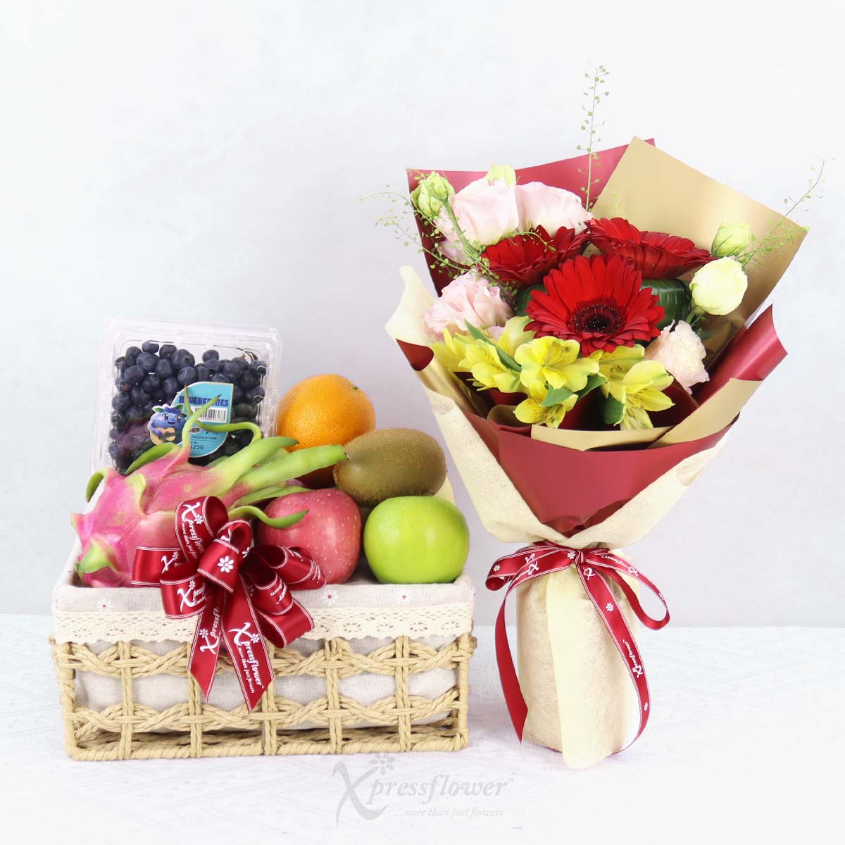 Bloom & Berry (Red Gerberas Bouquet with Fruits Basket)