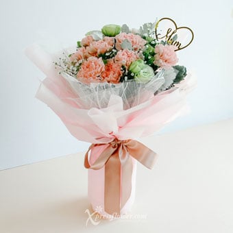 MDBQ2202 Mum's Embrace (12 Pink Carnations with 'Mum' Heart Decor)