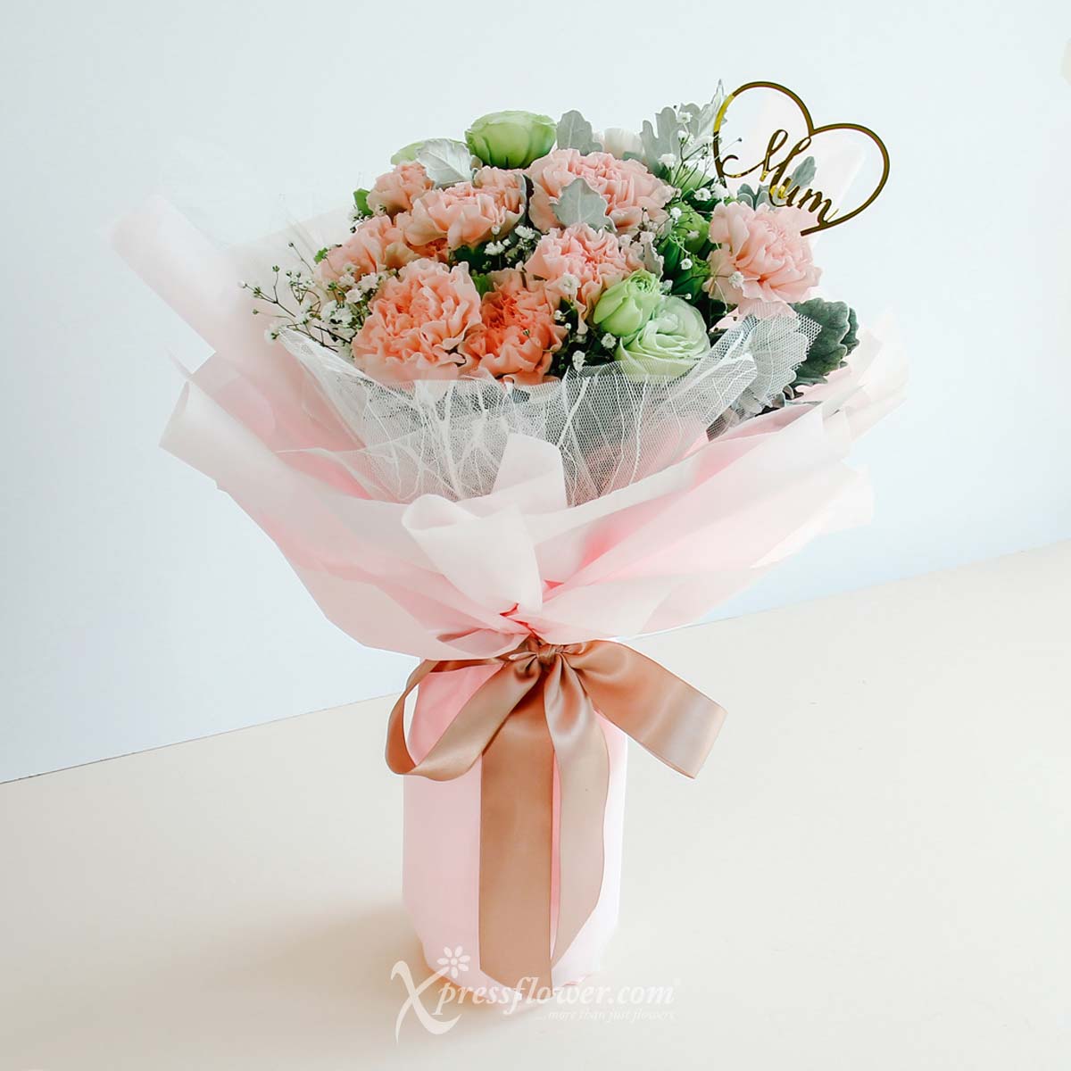 Mum’s Embrace (12 Pink Carnations with "Mum" Heartshape Decor)