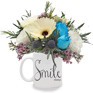 Delicate Smiles (3 White Gerberas & 3 Blue Roses with 'Smile Always' Mug)