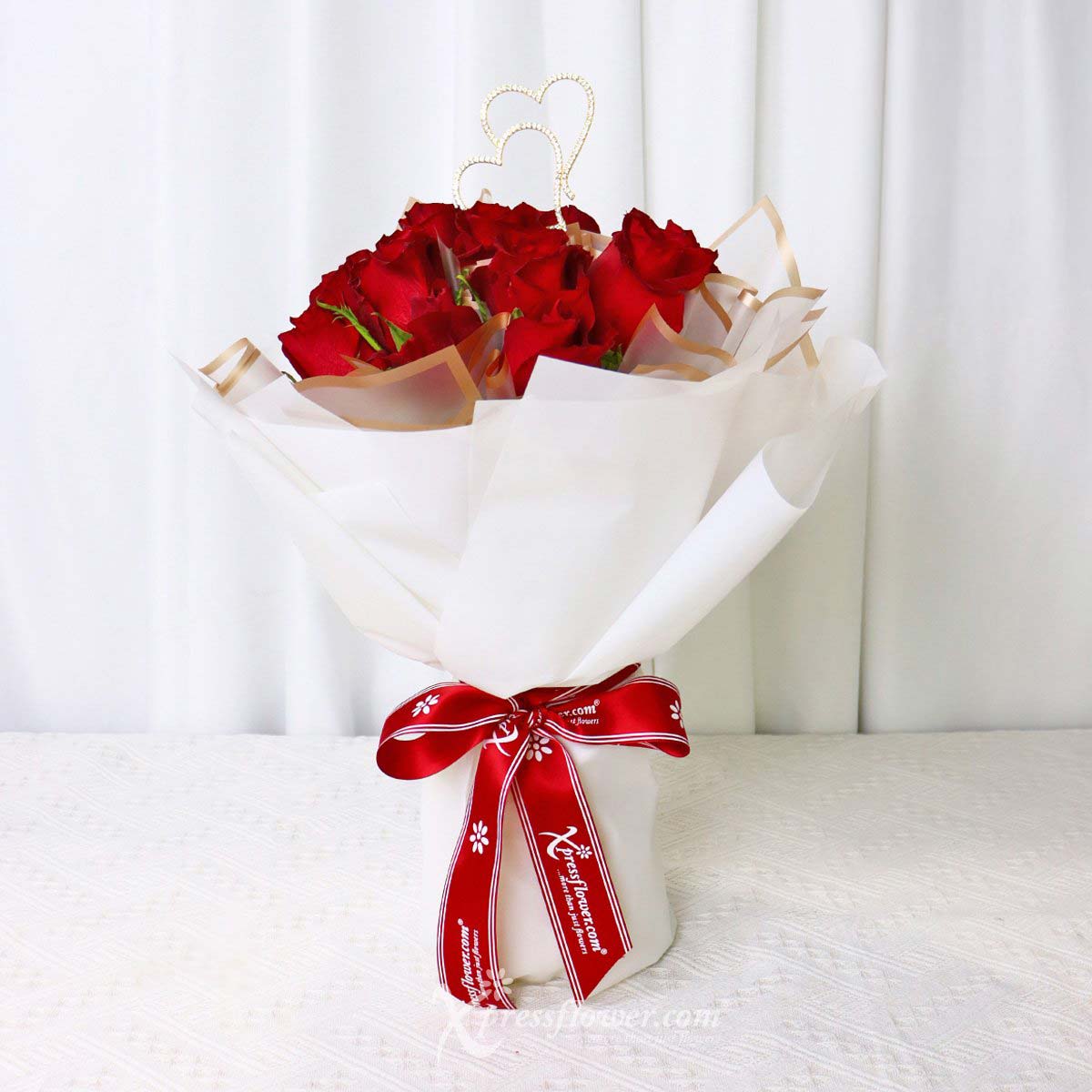 Stunning Crimson (12 Red Roses with Dual Heart Decor)