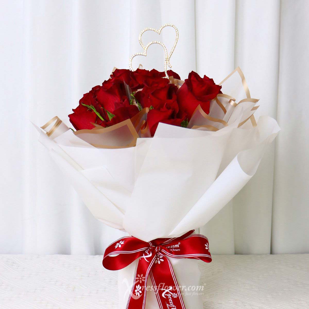 bq2302 stunning crimson 12 red roses with dual heart decor 1b