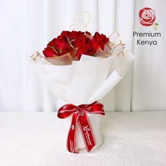 BQ2302 Stunning Crimson (12 Red Roses with Dual Heart Decor)