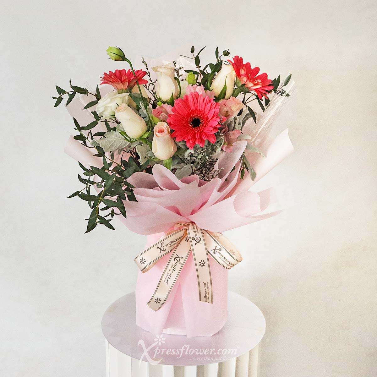 Garden Serenade (6 Center Pink Roses & 3 Dark Pink Gerberas) 