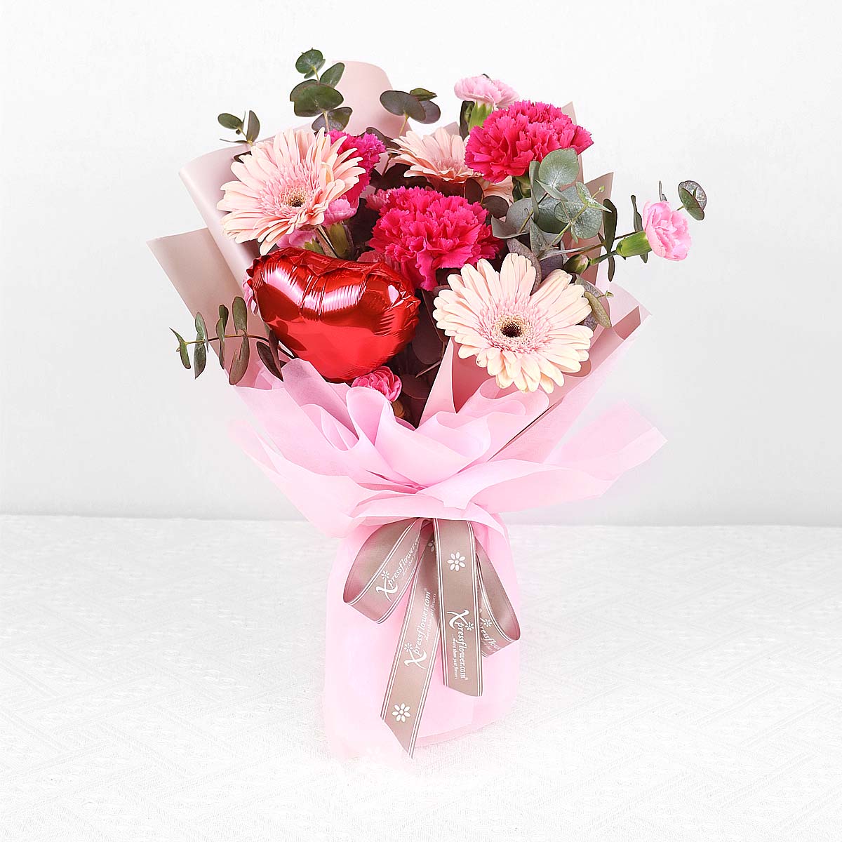 Darling Demeanor (3 Dark Shocking Pink Carnations & 3 Pink Gerberas with 4” Heart Balloon) 