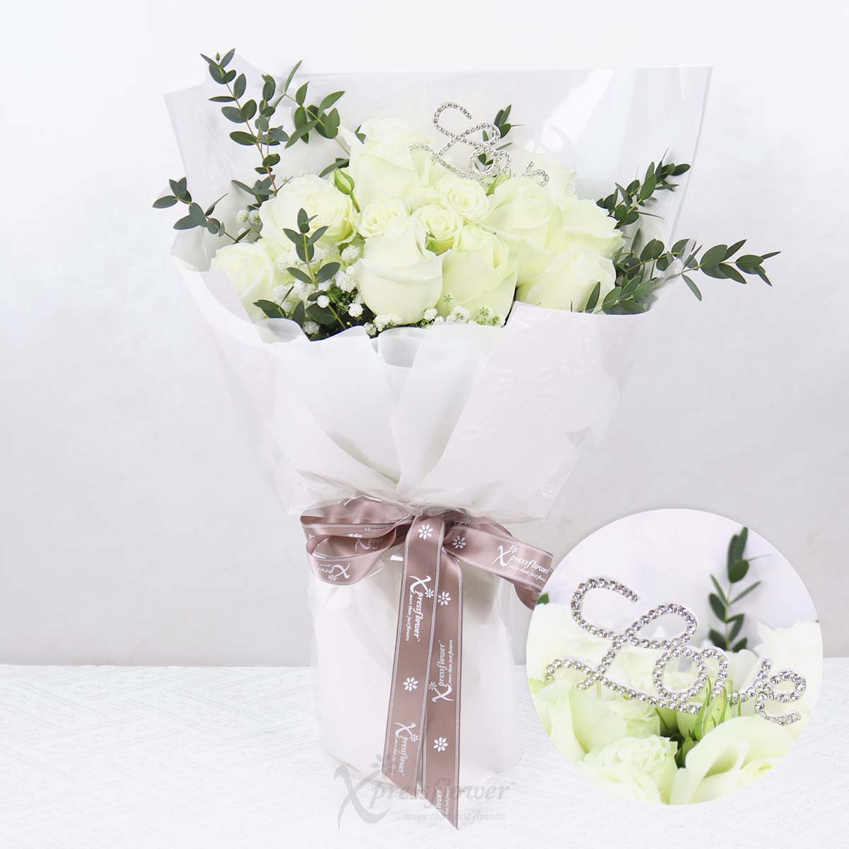 Ivory Whispers (12 White Roses with "Love" Decor Tag)