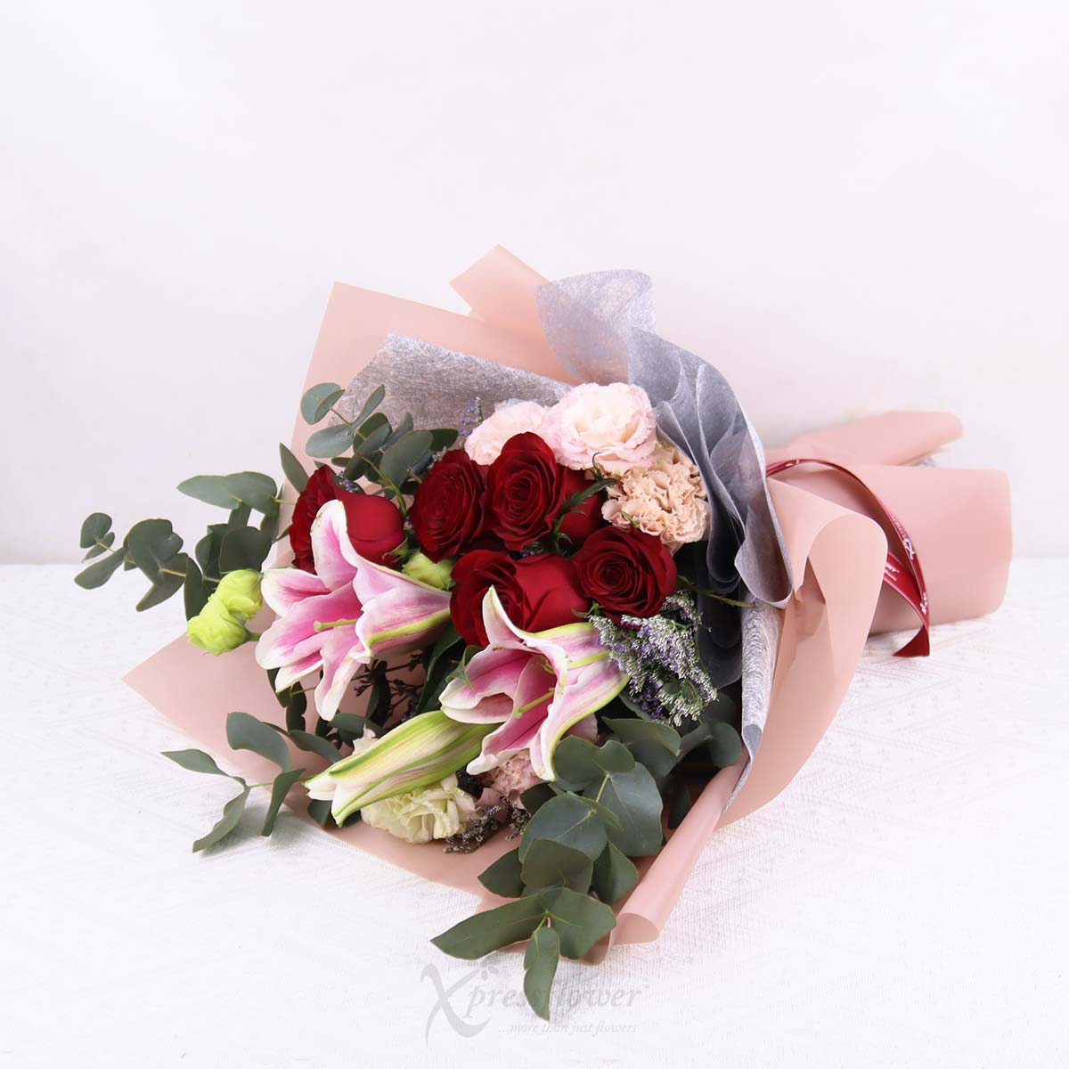 BQ2538 Radiant Grace Pink Lily Spray with 5 Red Roses 1b