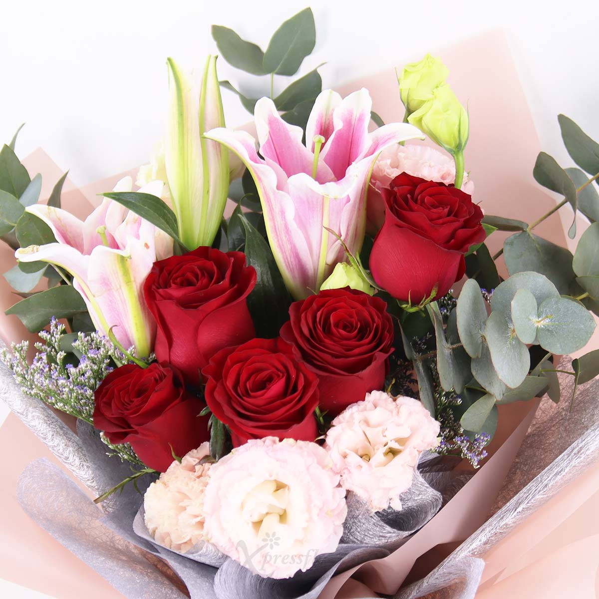 BQ2538 Radiant Grace Pink Lily Spray with 5 Red Roses 1c