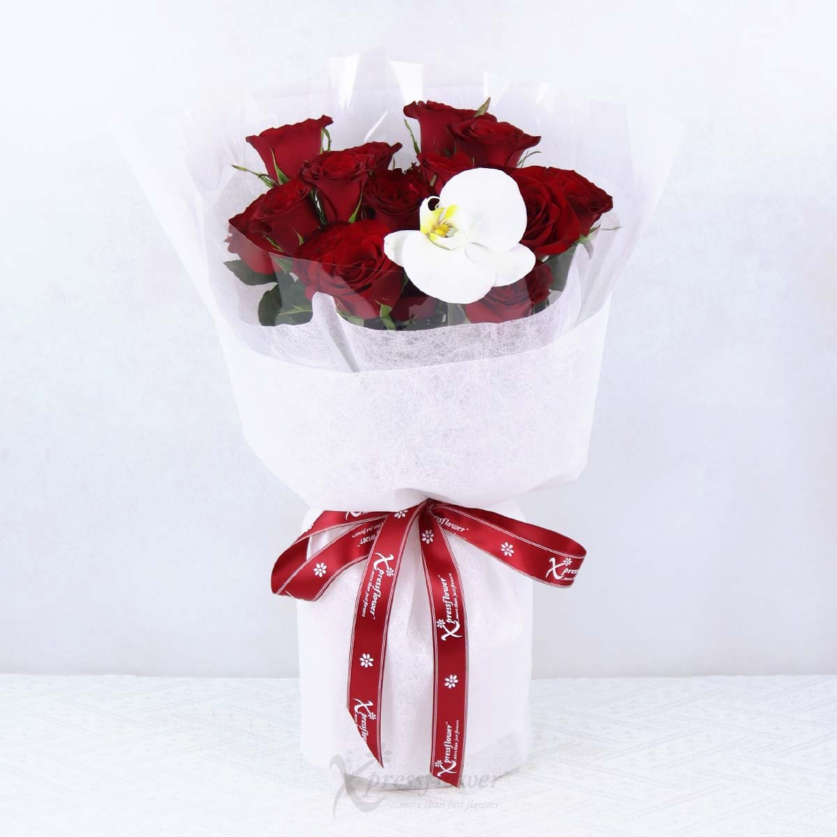 Orchid Flame (21 Red Roses with 1 White Orchid)
