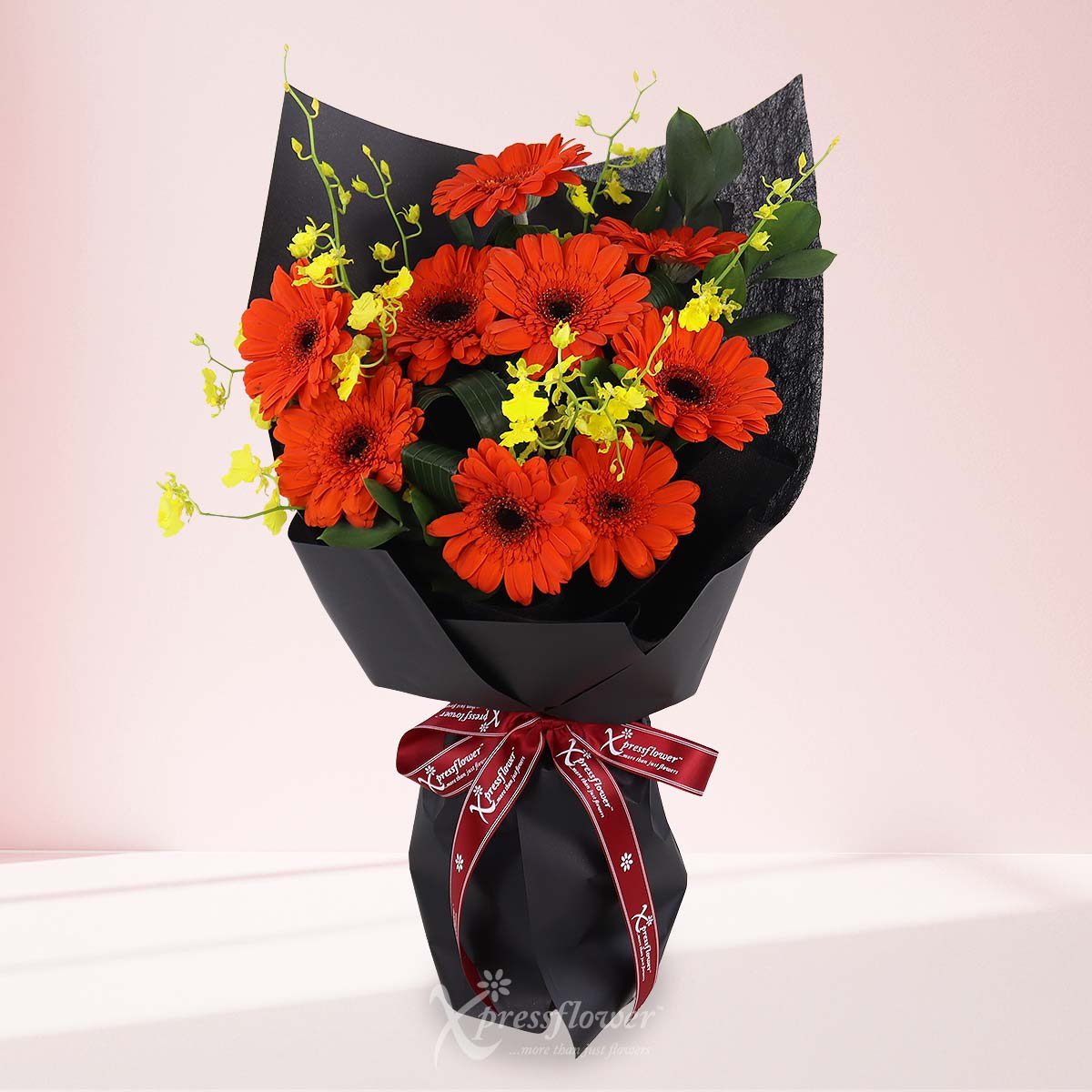 Midnight Blossom (9 Orange Gerberas) 