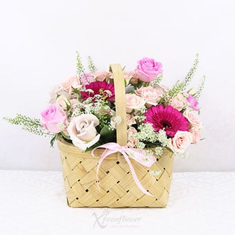 Whimsy Basket (7 Roses & 2 Gerberas)