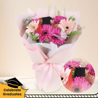 Dream Milestone (Mixed Purple & Pink Gerberas with Graduation Mortar Hat)