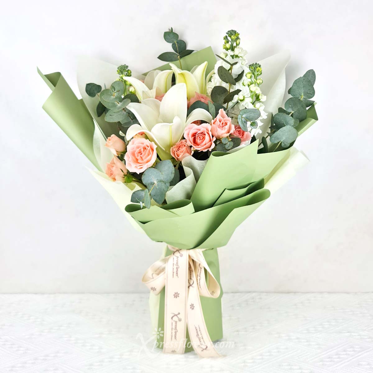 Lily Serenity (3 White Lilies with Pink Rose Sprays)