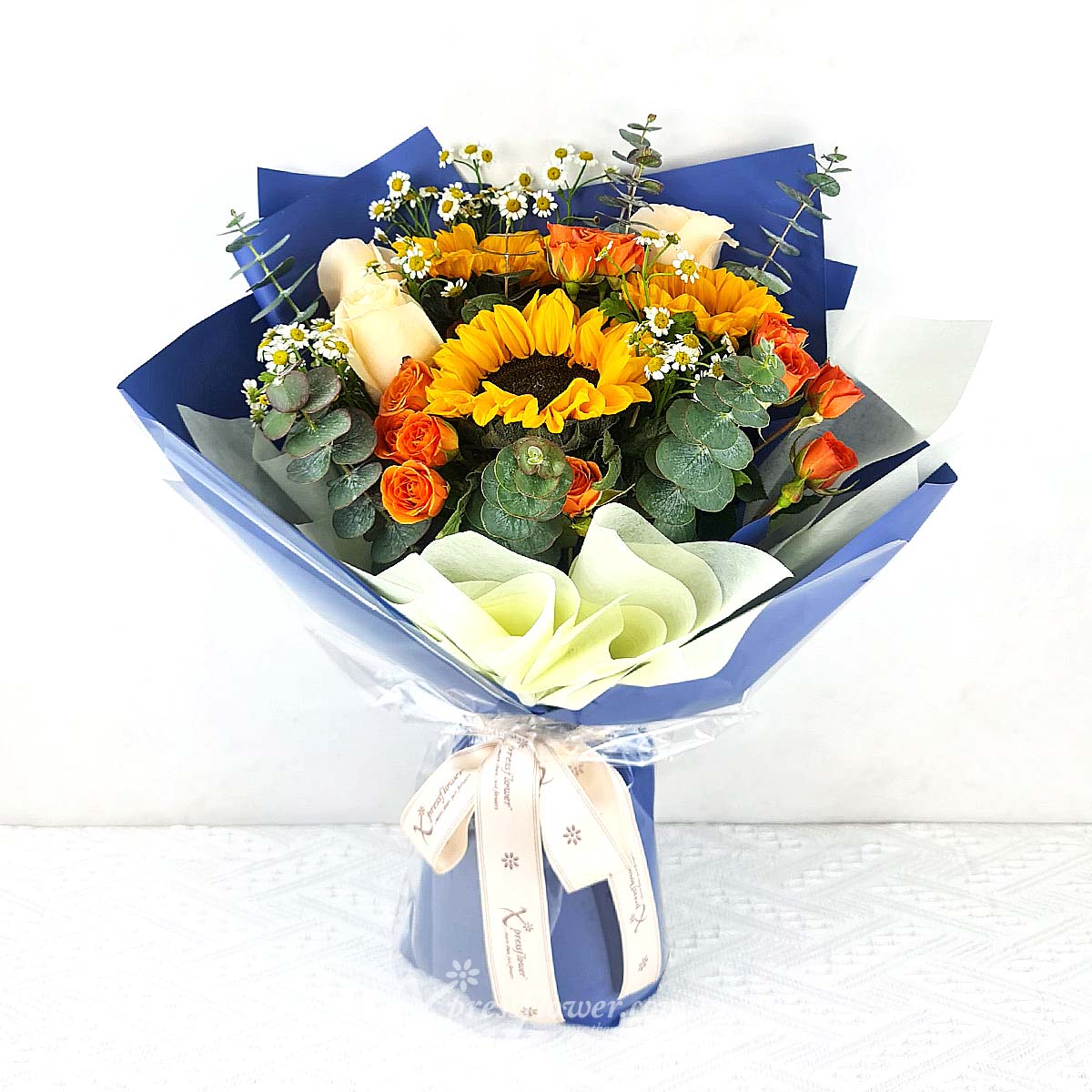 Radiant Sunshine (Sunflowers, Champagne Roses & Orange Rose Sprays)